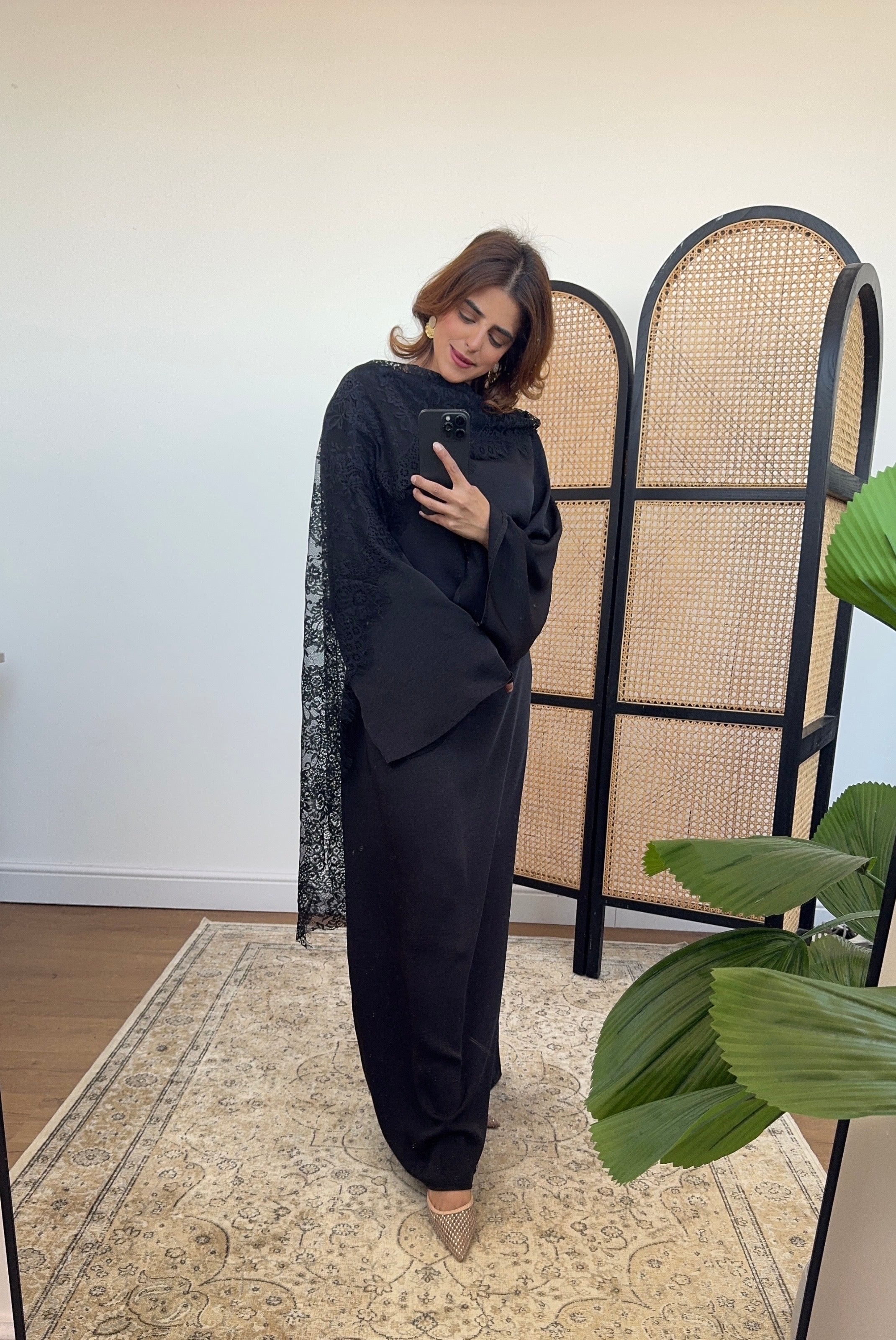 Black satin dress with lace scarf